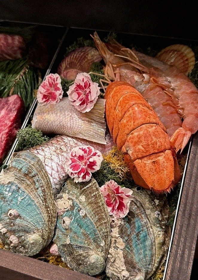 WOOHANA Yeouido · seafood course served alongside the beef