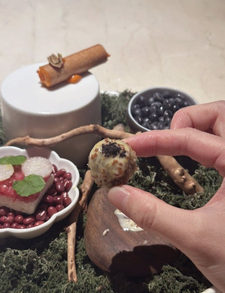 WOOARA Yeouido · the signature Hanwoo showing — marbled beef cuts and caviar presented in a display chest