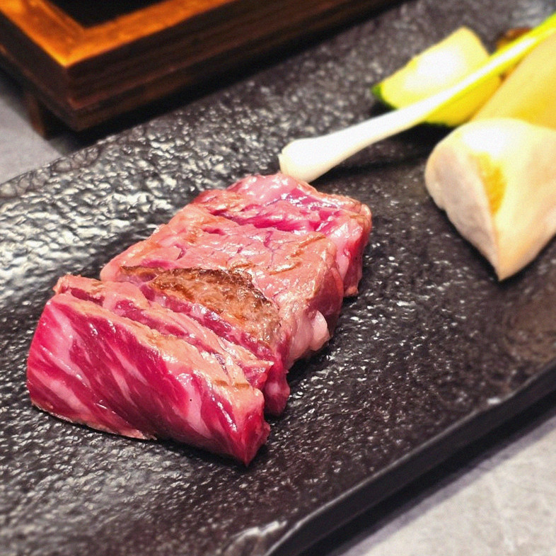 WOOHANA Yeouido · premium marbled Hanwoo beef presented before grilling