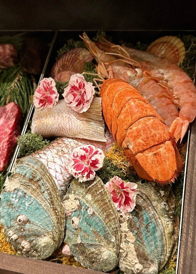 WOOHANA Yeouido · seafood course served alongside the beef