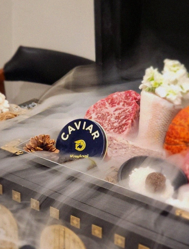 GOWOOGA Gwanghwamun · the signature Hanwoo showing — marbled beef cuts and caviar presented in a display chest