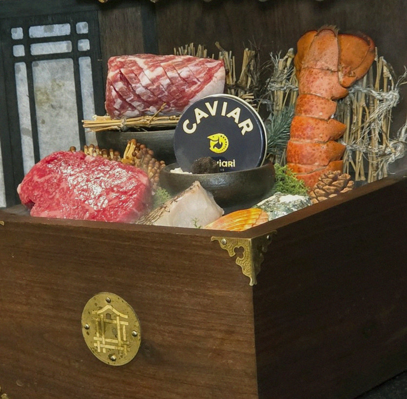 DAEBOJUNG Yeouido · the signature Hanwoo showing — marbled beef cuts and caviar presented in a display chest