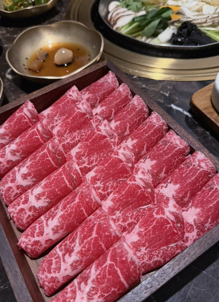 DAEBOJUNG Yeouido · premium marbled Hanwoo beef presented before grilling