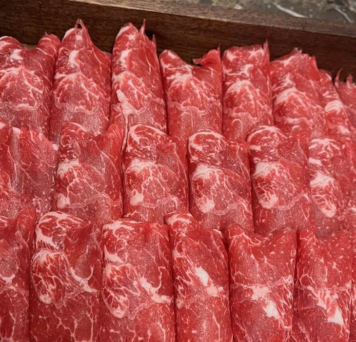 DAEBOJUNG City Hall · premium marbled Hanwoo beef presented before grilling
