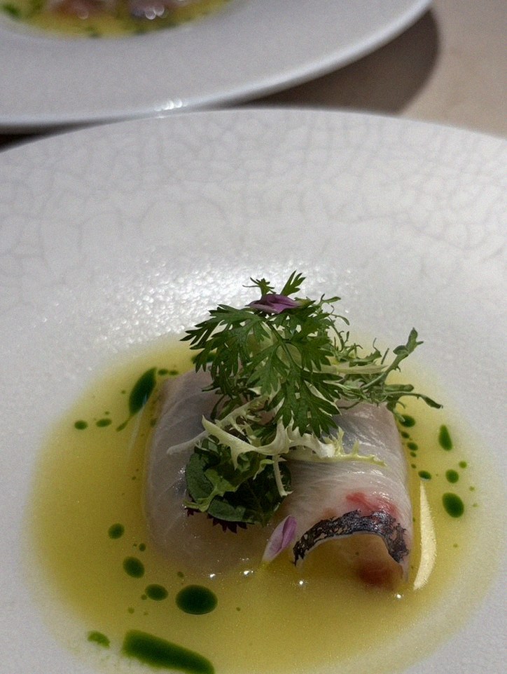 WOOARA Gwanghwamun · a plated course of Hanwoo beef
