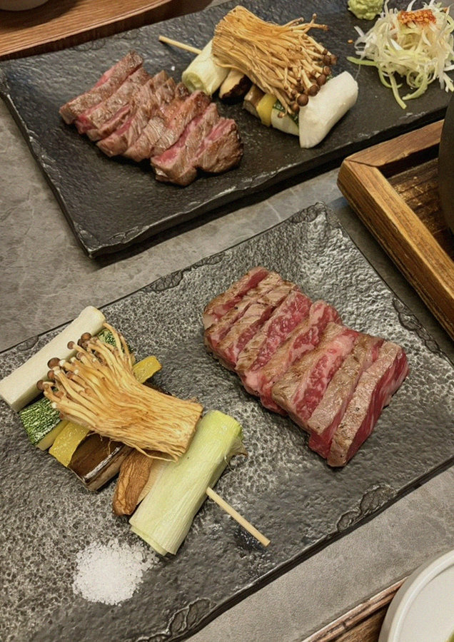 GOWOOGA Yeouido · premium marbled Hanwoo beef presented before grilling
