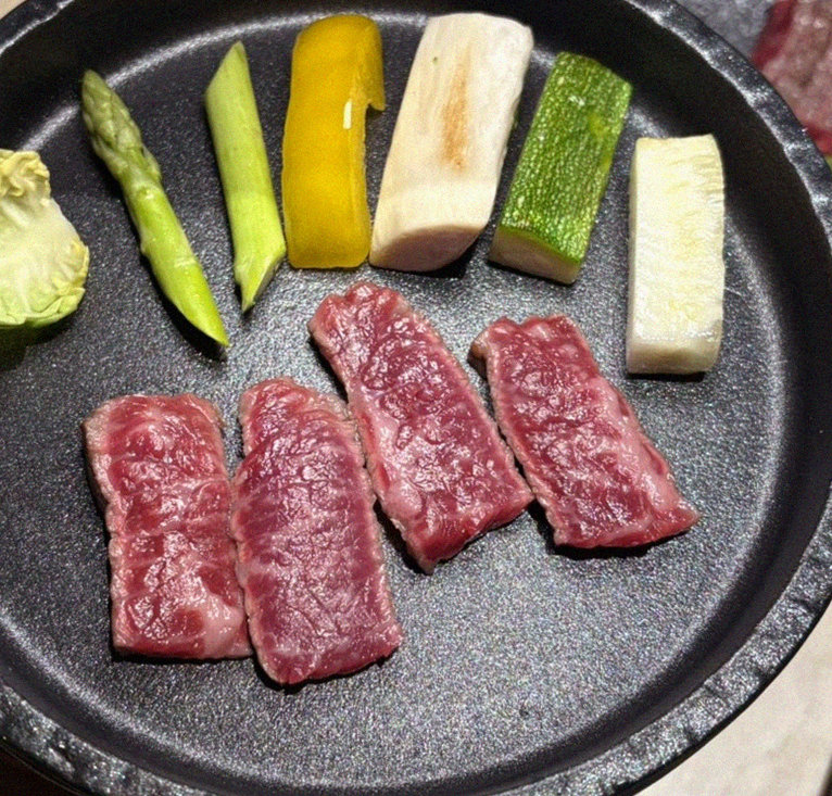 WOOARA Yeouido · premium marbled Hanwoo beef presented before grilling