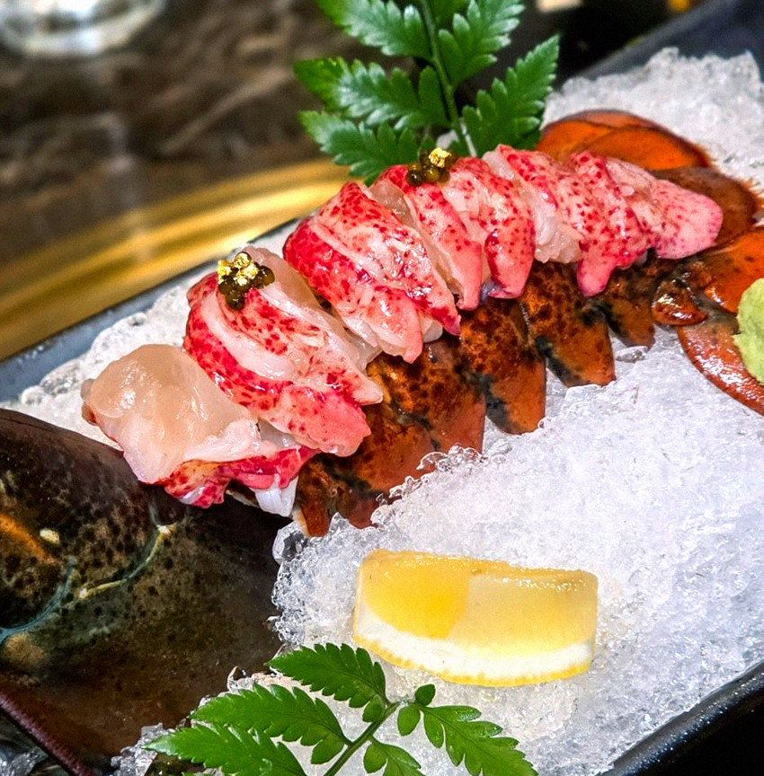 DAEBOJUNG Yeouido · the signature Hanwoo showing — marbled beef cuts and caviar presented in a display chest