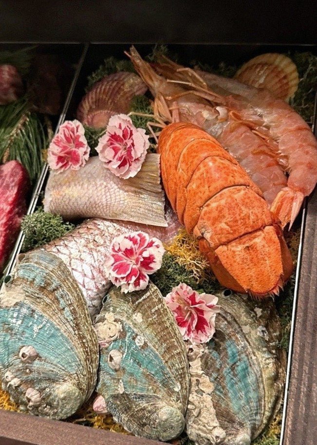 WOOHANA Yeouido · seafood course served alongside the beef