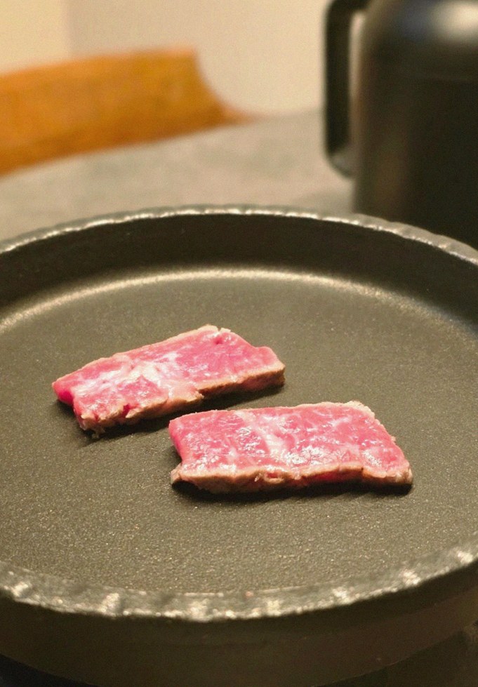 GOWOOGA Yeouido · premium marbled Hanwoo beef presented before grilling