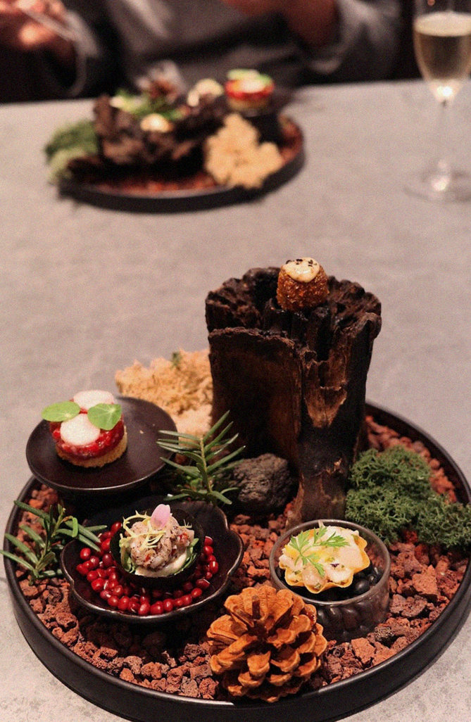 WOOHANA Jonggak · the signature Hanwoo showing — marbled beef cuts and caviar presented in a display chest