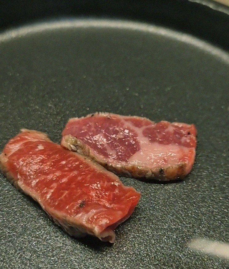 WOOARA Yeouido · premium marbled Hanwoo beef presented before grilling