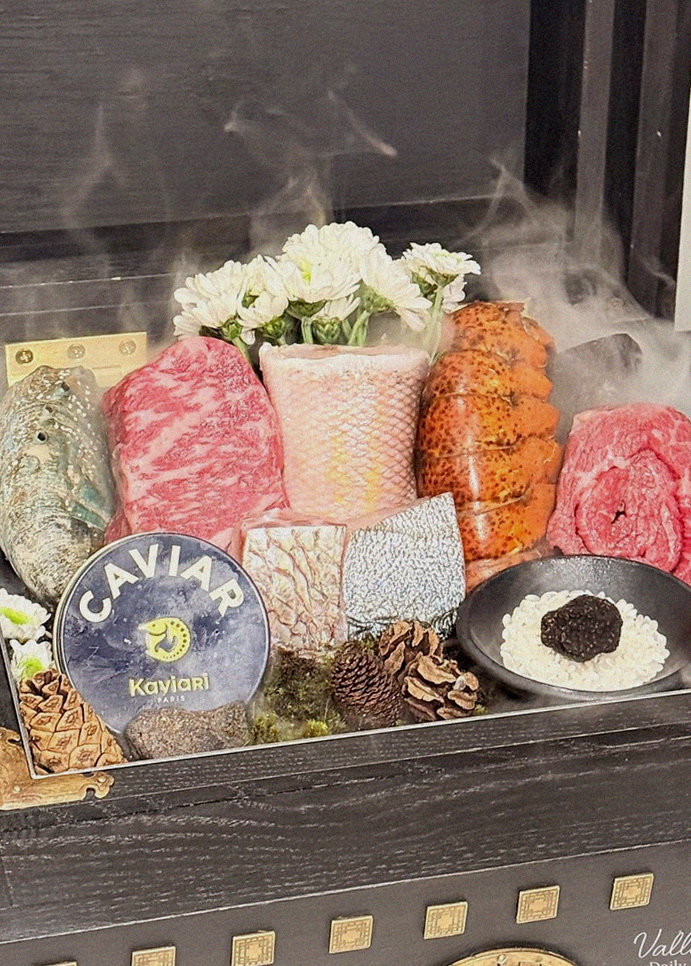 GOWOOGA Gwanghwamun · the signature Hanwoo showing — marbled beef cuts and caviar presented in a display chest