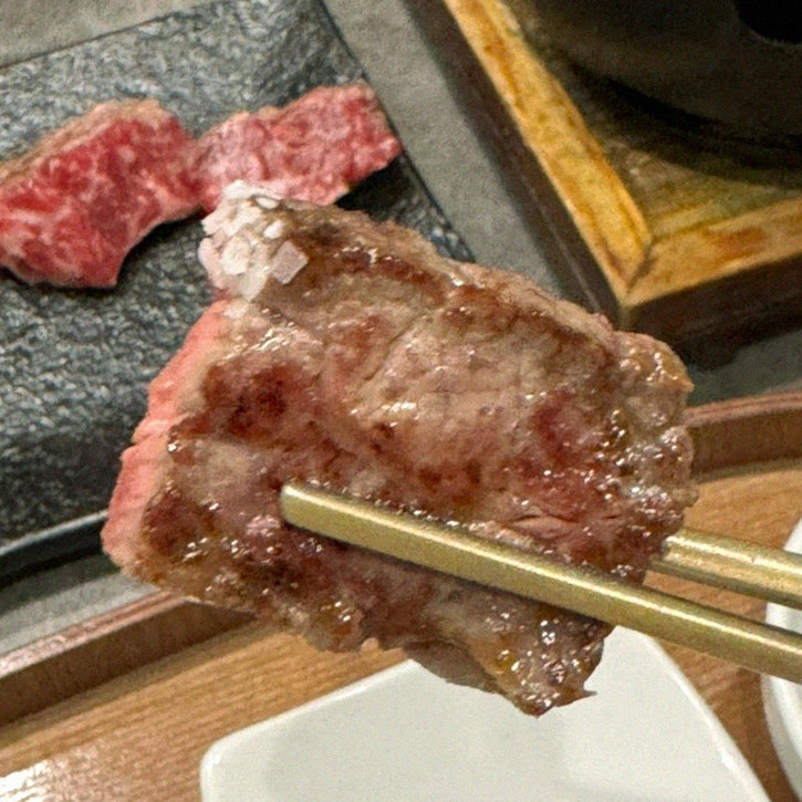 GOWOOGA Gwanghwamun · premium marbled Hanwoo beef presented before grilling