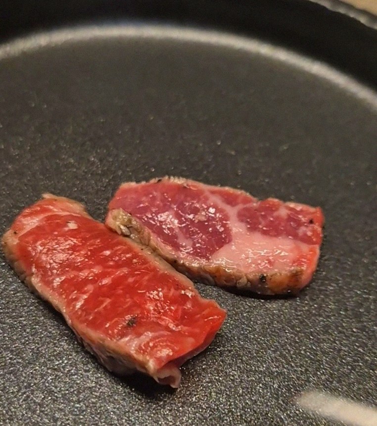 WOOARA Gwanghwamun · premium marbled Hanwoo beef presented before grilling