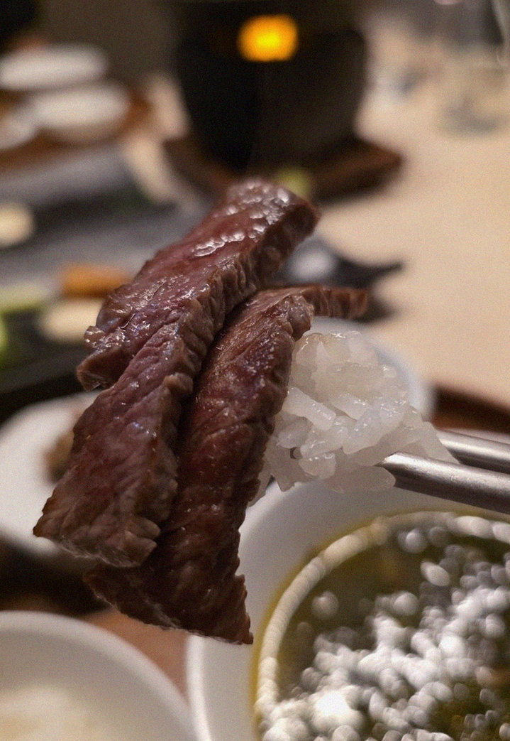 WOOARA Gwanghwamun · the signature Hanwoo showing — marbled beef cuts and caviar presented in a display chest
