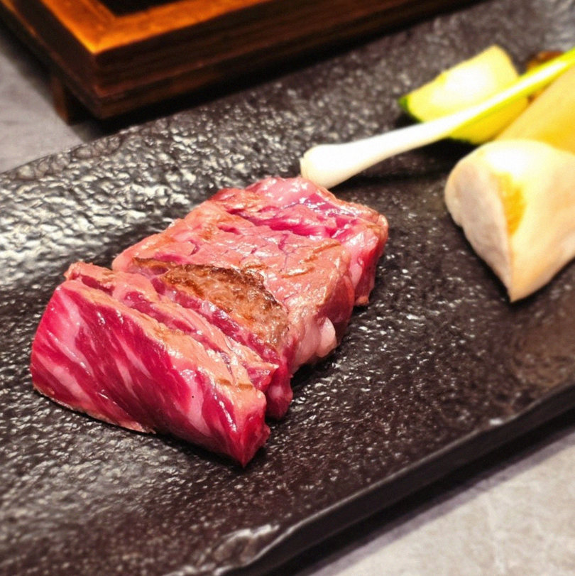 WOOHANA Yeouido · premium marbled Hanwoo beef presented before grilling