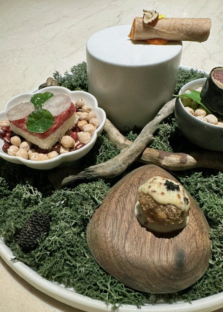 WOOARA Yeouido · the signature Hanwoo showing — marbled beef cuts and caviar presented in a display chest
