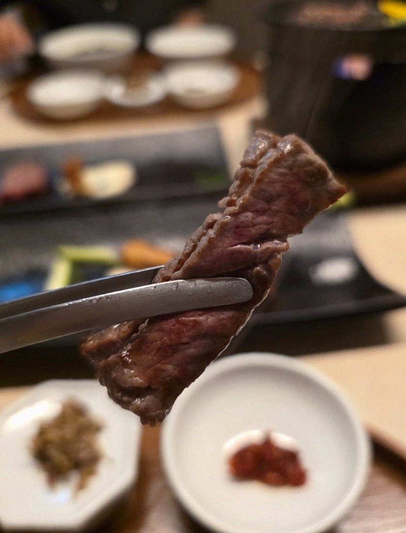 WOOARA Yeouido · premium marbled Hanwoo beef presented before grilling