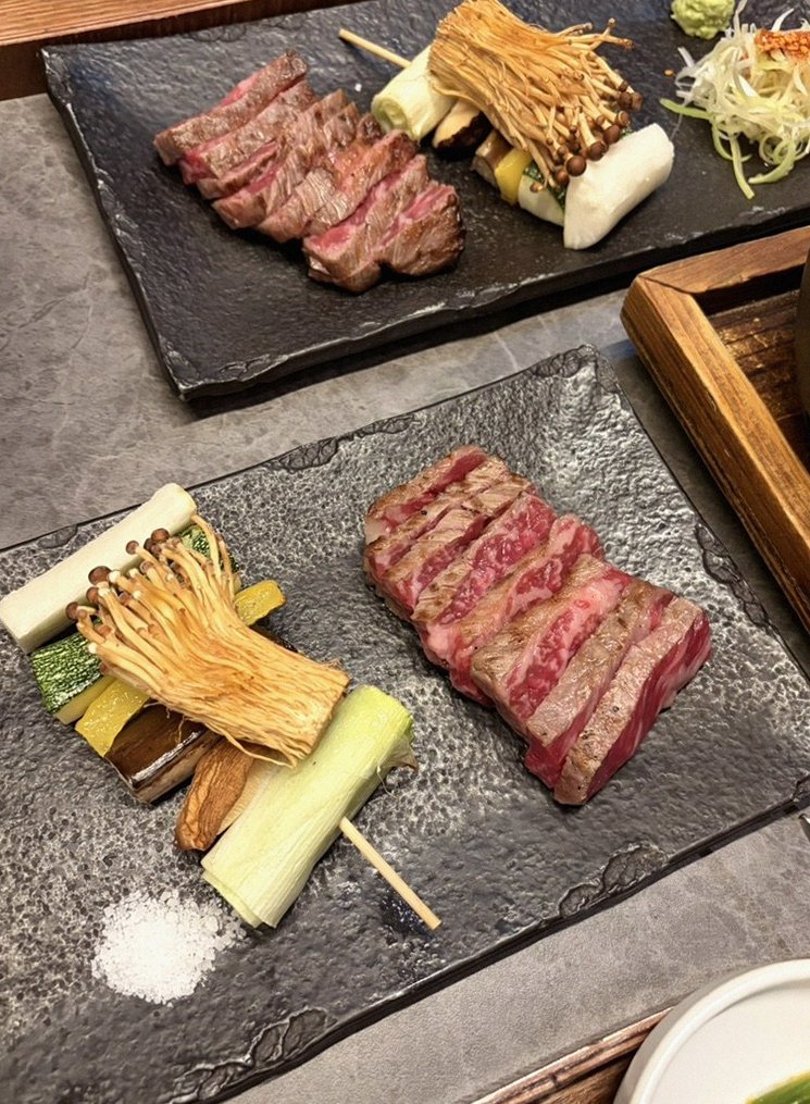 GOWOOGA Yeouido · premium marbled Hanwoo beef presented before grilling