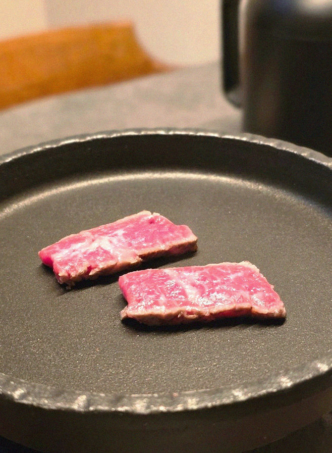 GOWOOGA Yeouido · premium marbled Hanwoo beef presented before grilling