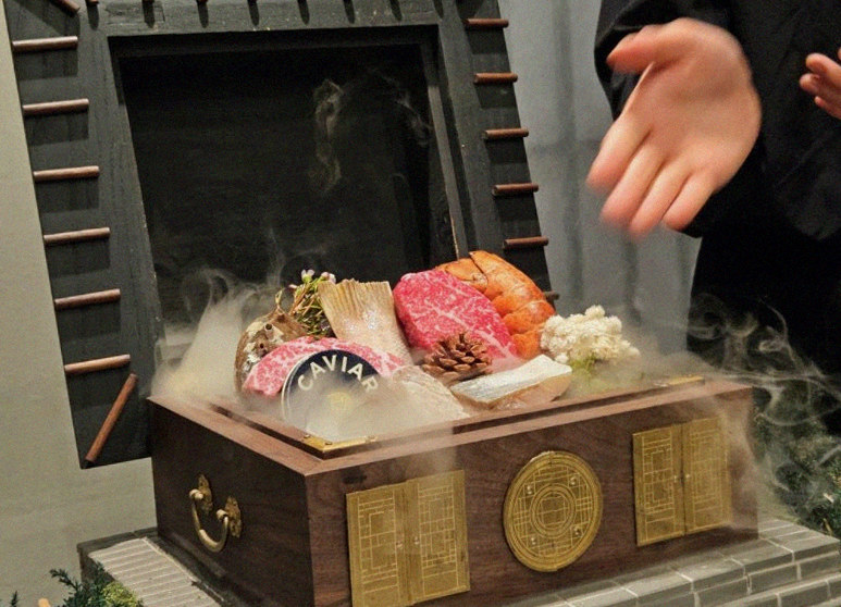 GOWOOGA Gangnam·Yeoksam · the signature Hanwoo showing — marbled beef cuts and caviar presented in a display chest