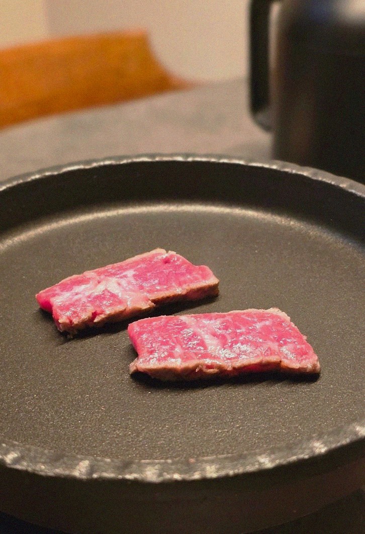 GOWOOGA Yeouido · premium marbled Hanwoo beef presented before grilling